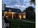 Inviting front exterior with stone facade, covered porch, and landscaped front yard at 5224 Boulevard Pl, Indianapolis, IN 46208