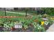 Beautiful front yard with colorful tulips and a stone address marker enhances curb appeal at 5224 Boulevard Pl, Indianapolis, IN 46208