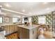 Open kitchen layout seamlessly connected to the dining area, promoting a fluid living space at 5224 Boulevard Pl, Indianapolis, IN 46208