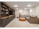 Spacious living room offers built-in shelving, comfortable seating, and ample space for recreation and relaxation at 5224 Boulevard Pl, Indianapolis, IN 46208