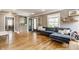 Living room boasts hardwood flooring, lots of natural light, and neutral decor at 5224 Boulevard Pl, Indianapolis, IN 46208