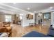 Open-concept living area with hardwood floors and easy access to the kitchen at 5224 Boulevard Pl, Indianapolis, IN 46208