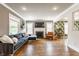 Elegant living room with hardwood floors, cozy seating, and a fireplace at 5224 Boulevard Pl, Indianapolis, IN 46208