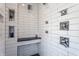 Shower with multiple shower heads, subway tile, and built-in niche at 5224 Boulevard Pl, Indianapolis, IN 46208