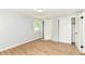 Inviting room featuring wood-look flooring and a spacious closet at 5721 Daphne Dr, Indianapolis, IN 46278