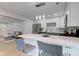 Bright eat-in kitchen featuring a center island, stainless steel appliances, and pendant lighting at 5811 King Ave, Indianapolis, IN 46228