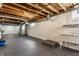 Spacious unfinished basement with sink and mechanics offers flexible usage at 5912 Evanston Ave, Indianapolis, IN 46220