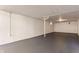 Spacious unfinished basement with painted walls and floor offers flexible potential at 5912 Evanston Ave, Indianapolis, IN 46220