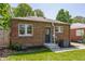 Brick home with charming backyard and easy access back door at 5912 Evanston Ave, Indianapolis, IN 46220