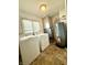 Functional laundry room with modern appliances, offering convenience and efficiency at 6335 Linden Dr, Indianapolis, IN 46227