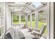 Bright shed interior with skylights, couch and chairs, offering a cozy retreat with ample natural light at 6401 N Oakland Ave, Indianapolis, IN 46220