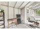 Shed interior with skylights, a desk, shelving, and seating for a flexible space in this outbuilding at 6401 N Oakland Ave, Indianapolis, IN 46220