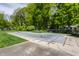 Large backyard with an in-ground pool covered with a safety net at 7770 N Pennsylvania St, Indianapolis, IN 46240