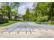 Large backyard with an in-ground pool covered with a safety net at 7770 N Pennsylvania St, Indianapolis, IN 46240