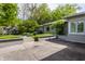 Well-maintained single-story home with landscaped front yard and inviting curb appeal at 7770 N Pennsylvania St, Indianapolis, IN 46240