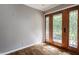 Bright foyer with hardwood floors and decorative glass paneled doors allowing natural light at 7770 N Pennsylvania St, Indianapolis, IN 46240