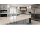 Stylish kitchen featuring stainless steel appliances, countertops, and updated cabinetry at 7770 N Pennsylvania St, Indianapolis, IN 46240