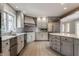 Modern kitchen featuring stainless appliances, countertops and custom cabinetry at 7770 N Pennsylvania St, Indianapolis, IN 46240