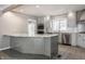 Bright kitchen with stainless appliances, granite countertops and custom cabinetry at 7770 N Pennsylvania St, Indianapolis, IN 46240