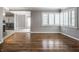 Inviting room featuring hardwood floors and large windows at 7770 N Pennsylvania St, Indianapolis, IN 46240