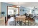 Cozy dining room with round table, an open floor plan to the adjacent living spaces at 8145 Bentley Farms Dr, Indianapolis, IN 46259