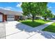 A well-maintained house with a manicured front lawn and attractive landscaping at 8145 Bentley Farms Dr, Indianapolis, IN 46259