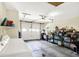 Spacious garage featuring an automatic door and plenty of room for storage and laundry machines at 8145 Bentley Farms Dr, Indianapolis, IN 46259
