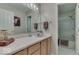 Bright bathroom with a vanity, a mirror, and a shower-tub combination at 8507 Promontory Rd, Indianapolis, IN 46236
