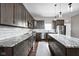 Modern kitchen featuring sleek countertops, stainless steel appliances, and ample cabinetry for storage at 863 N Park Trail Dr, Carmel, IN 46032