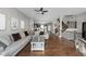 Spacious open-concept living room featuring hardwood floors, neutral walls and plenty of light at 863 N Park Trail Dr, Carmel, IN 46032
