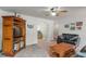 Open living room showcasing a spacious layout and neutral-toned carpet at 8636 Rockville Rd, Indianapolis, IN 46234