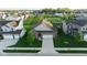 Beautiful aerial view of home showing manicured lawn and community park with walking trails and playground at 934 Steel Horse Dr, Westfield, IN 46074