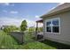 View of fenced backyard featuring a pergola-covered patio and well-maintained lawn at 934 Steel Horse Dr, Westfield, IN 46074