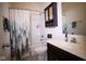 Clean bathroom with a shower-tub combo, vanity with sink, and storage cabinet for toiletries and essentials at 934 Steel Horse Dr, Westfield, IN 46074