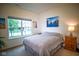 Bright bedroom with a large window, a comfortable bed, and tasteful decor for a relaxing ambiance at 934 Steel Horse Dr, Westfield, IN 46074