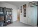 Well-lit bedroom with decoratively adorned walls, closet, and shelving unit for storage and organization at 934 Steel Horse Dr, Westfield, IN 46074