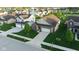 Beautifully landscaped suburban home with a well-manicured lawn, long driveway, and attached two-car garage at 934 Steel Horse Dr, Westfield, IN 46074