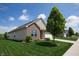 Attractive home with a manicured lawn, flowering plants, and a well-maintained exterior at 934 Steel Horse Dr, Westfield, IN 46074