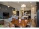 Inviting living space with an open floor plan, kitchen island, dining area, and modern finishes at 934 Steel Horse Dr, Westfield, IN 46074
