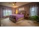 Cozy main bedroom with plush bedding, natural light from the windows, and neutral carpet at 934 Steel Horse Dr, Westfield, IN 46074
