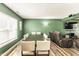 Dining room features a large wooden table and comfortable chairs, perfect for Gathering gatherings at 941 Pine Ridge Way, Brownsburg, IN 46112
