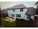 Back of house with patio; perfect for outdoor dining and relaxing at 9879 Brightwater Dr, Fishers, IN 46038