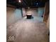Spacious basement with exposed ceiling, perfect for recreation or additional living space at 9879 Brightwater Dr, Fishers, IN 46038