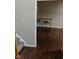Warm entryway with hardwood floors leading to additional space, nice trim at 9879 Brightwater Dr, Fishers, IN 46038