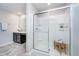 Bathroom view showcasing the glass enclosed shower, vanity, and modern tile flooring at 991 Terra Ln, Franklin, IN 46131