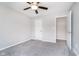 A view of a well-lit secondary bedroom with carpet, a ceiling fan, and neutral walls at 991 Terra Ln, Franklin, IN 46131