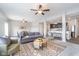 Open-concept living area with modern furnishings, a view of the kitchen, and plenty of space for relaxation at 991 Terra Ln, Franklin, IN 46131