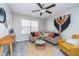 Stylish loft space featuring modern decor, ceiling fan, and lots of natural light creating an inviting atmosphere at 991 Terra Ln, Franklin, IN 46131