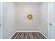Cozy mudroom with wood-look floors, a coat rack, and neutral paint creating a clean and inviting space at 991 Terra Ln, Franklin, IN 46131
