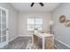 Sunlit office featuring neutral walls, modern light fixture, and stylish decor, creating a welcoming workspace at 991 Terra Ln, Franklin, IN 46131